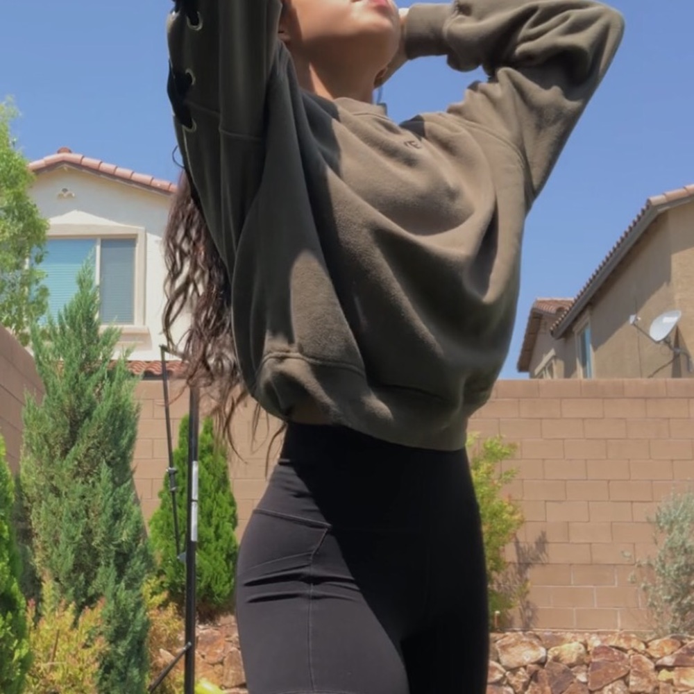 Green lace up crew neck